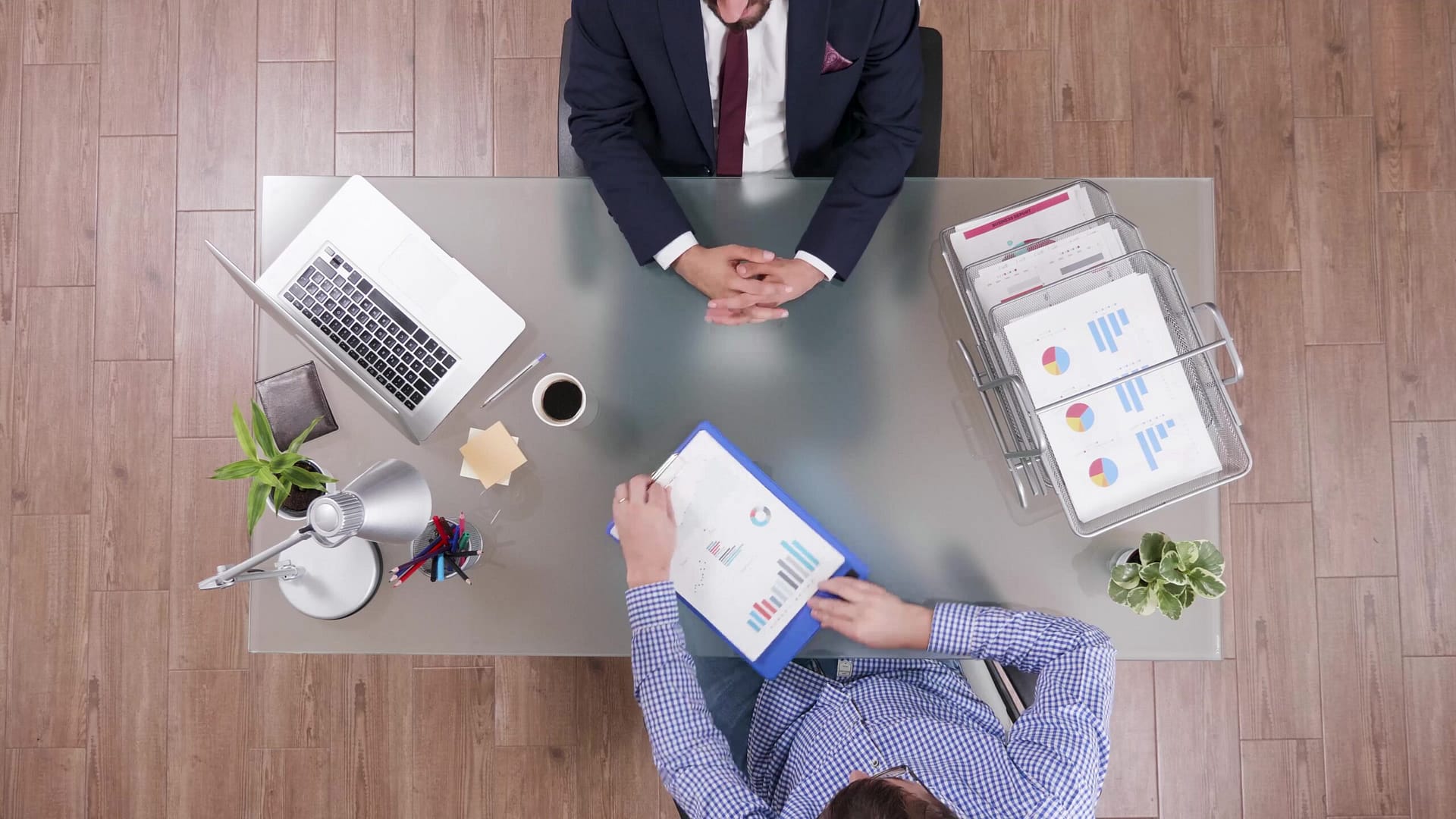 top view businessman analyzing financial documents discussing company strategy 1 scaled